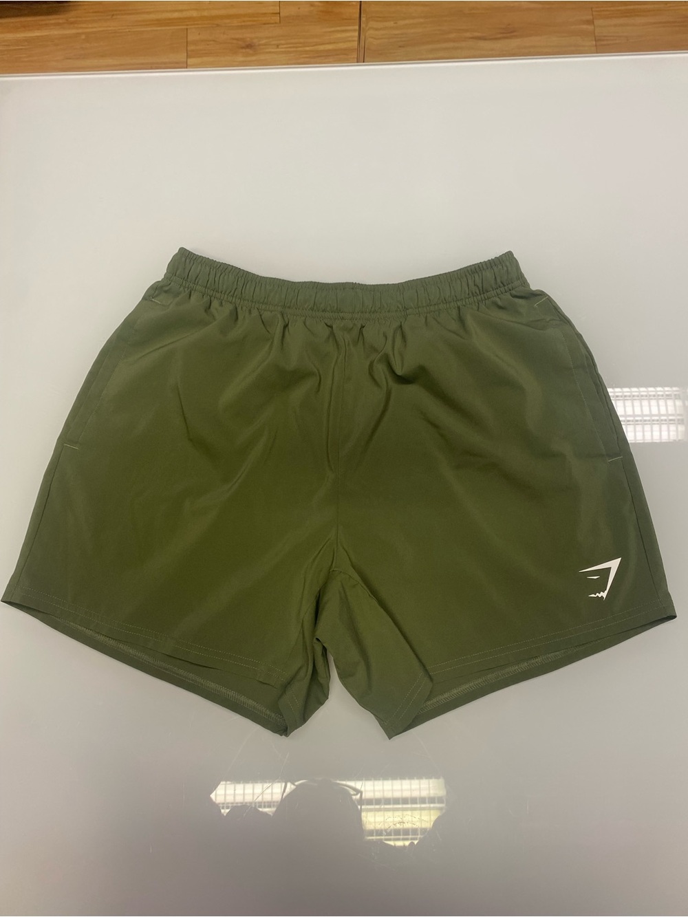 Gymshark Olive Green Athletic Shorts with White Logo